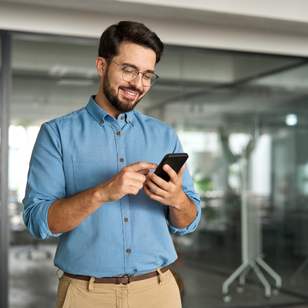 Male Professional At Office On Phone 600X600