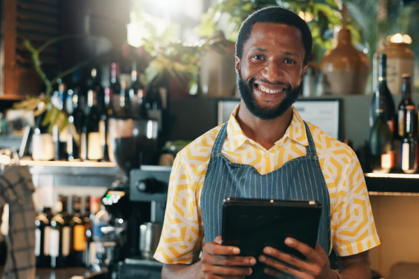 Shopkeeper Smiling After Contacting Business 600X400